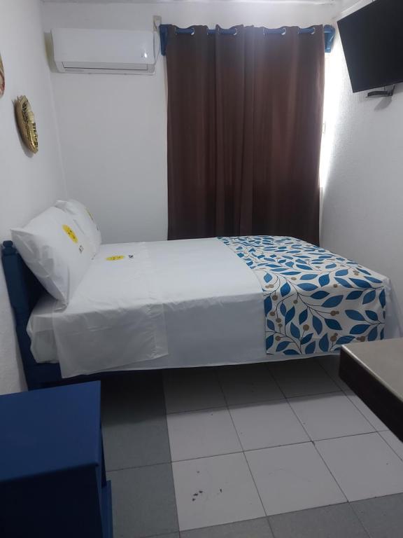 Postel nebo postele na pokoji v ubytování HOTEL INTI