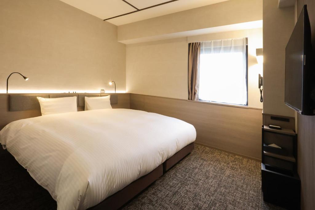 TV a/nebo společenská místnost v ubytování SK HOTEL Kobe Ekimae