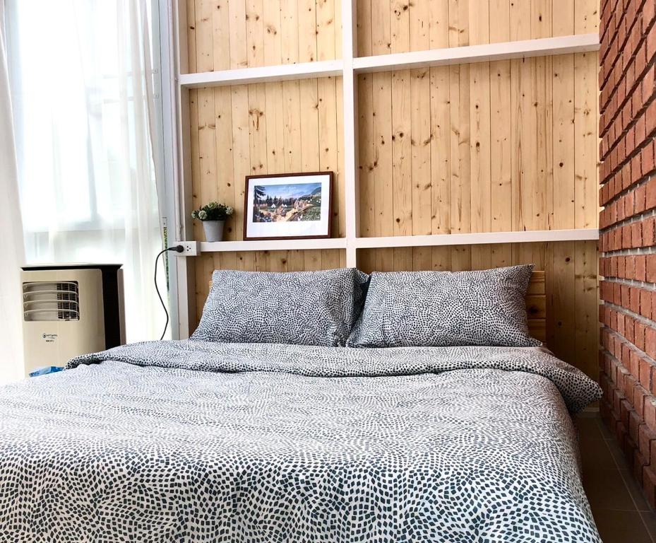 Postel nebo postele na pokoji v ubytování นอนนิ่ง อิงดาว
