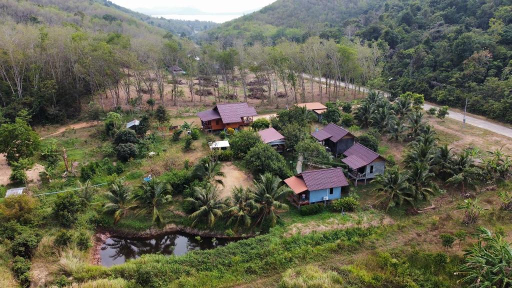 an aerial view of a village on a hill at Green Mountain Resort Koh Yao in Ko Yao Yai