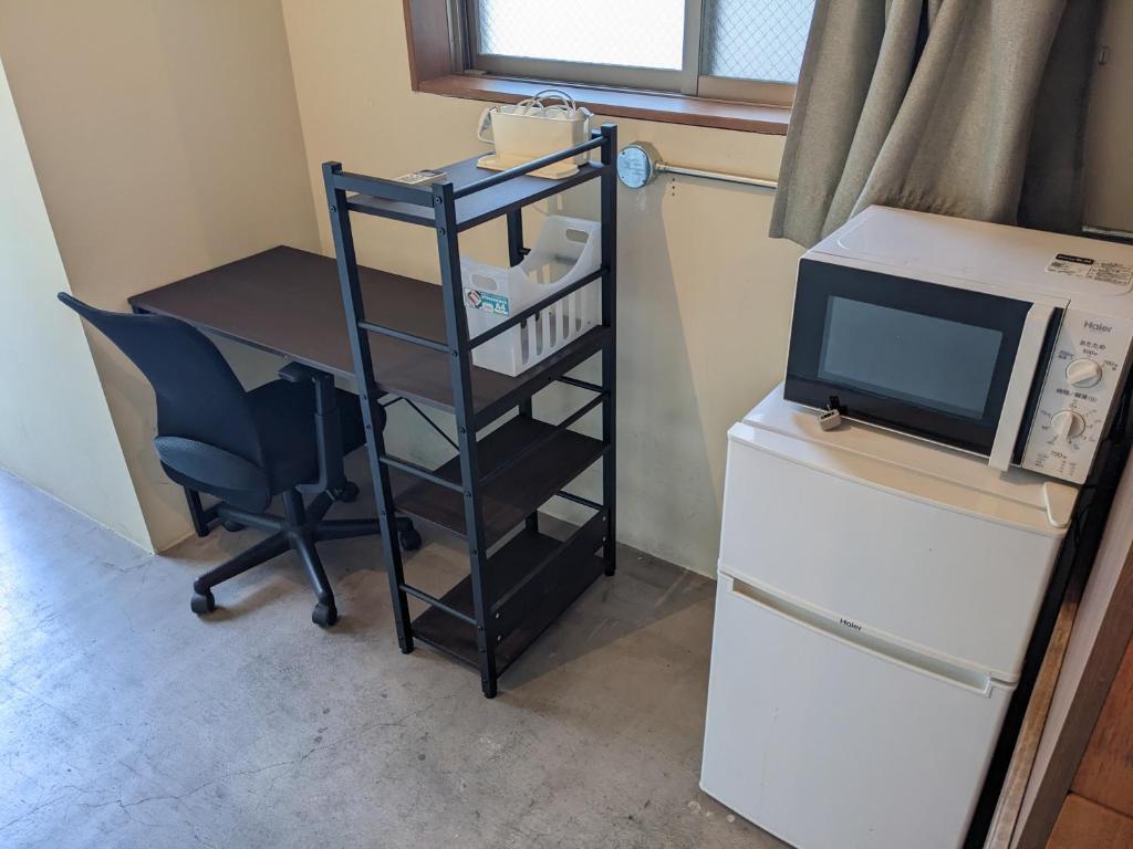 Kuchyň nebo kuchyňský kout v ubytování Hostel JIN