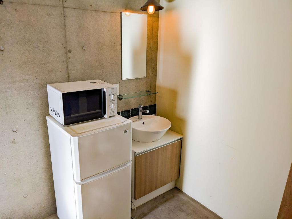 Kuchyň nebo kuchyňský kout v ubytování Hostel JIN