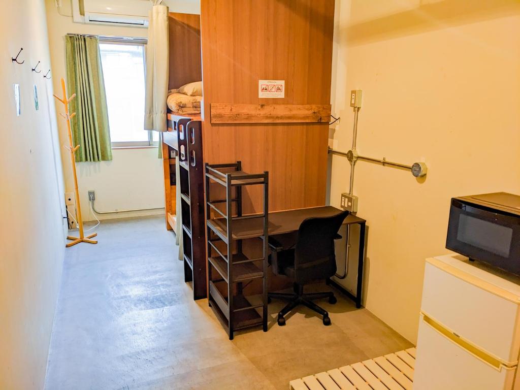 TV a/nebo společenská místnost v ubytování Hostel JIN