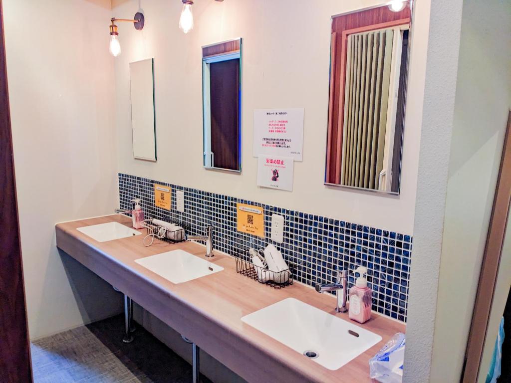 Koupelna v ubytování Hostel JIN