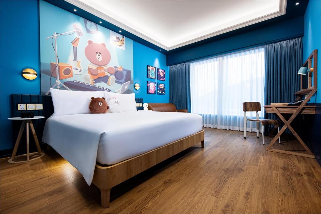 Postel nebo postele na pokoji v ubytování LINE FRIENDS presents CASA DE AMIGO