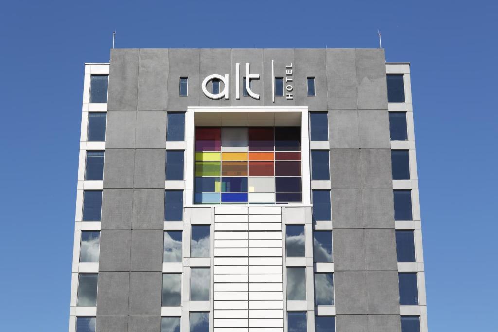 a tall building with a pride sign on it at Alt Hotel Toronto Airport in Mississauga