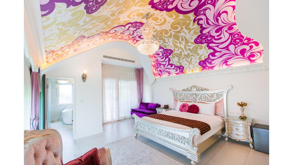 a bedroom with a bed and a purple ceiling at Jane Castle in Wujie