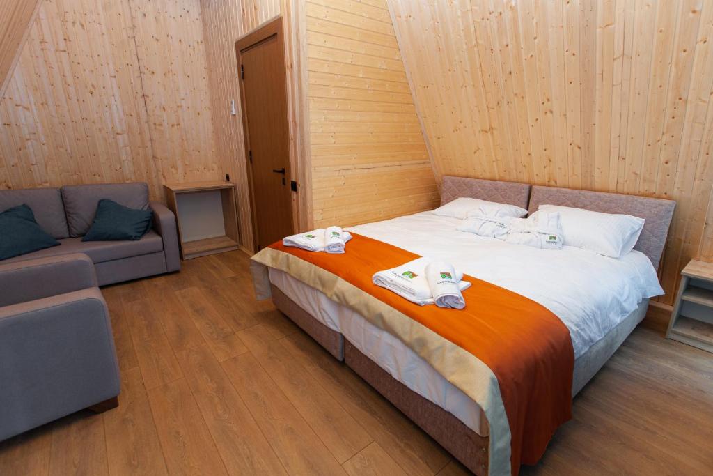 Postel nebo postele na pokoji v ubytování Reserve Resort Lagodekhi