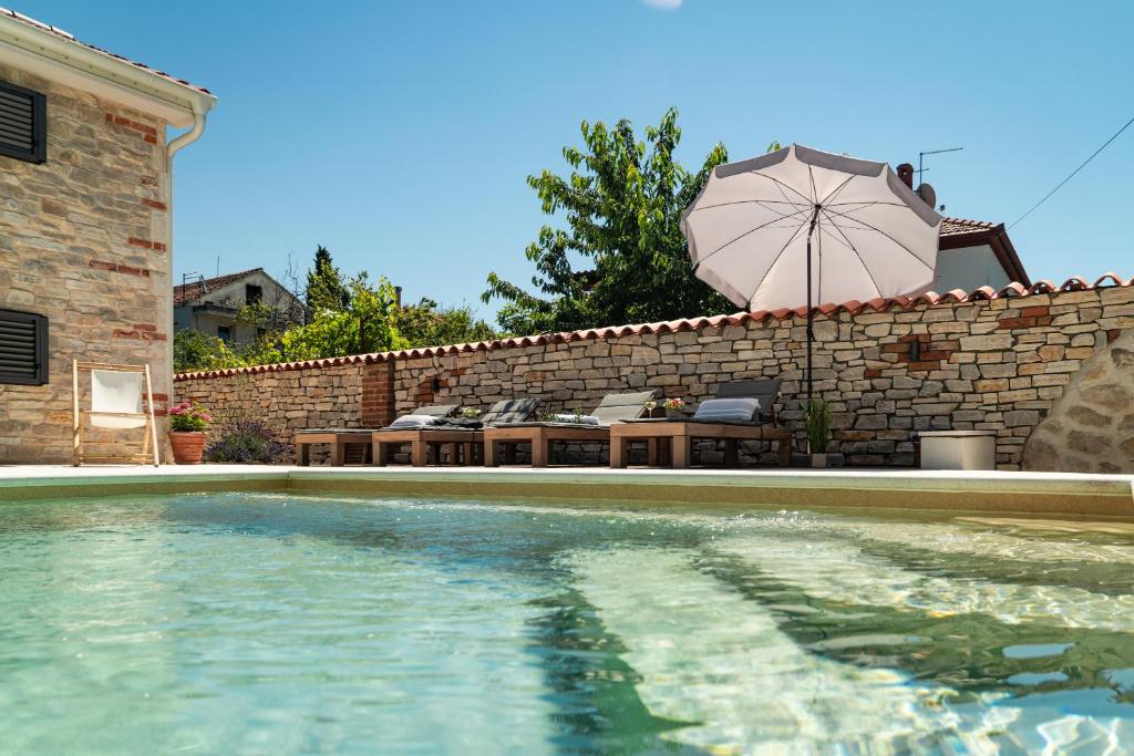 Swimmingpoolen hos eller tæt på Vi la Mare - Mediterranes Apartment-Feeling mit Poolgenuss