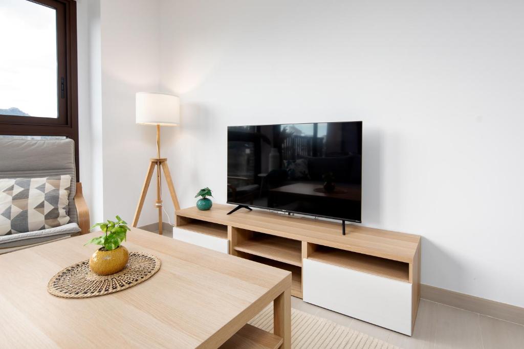 TV a/nebo společenská místnost v ubytování Las Lomas