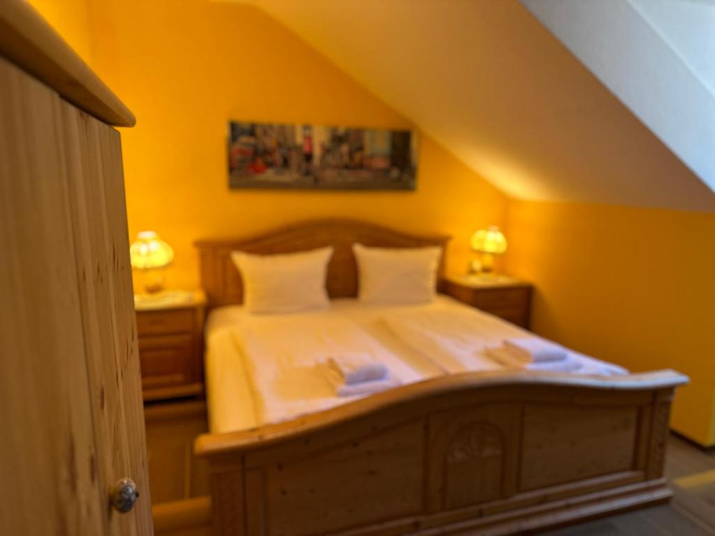 Postel nebo postele na pokoji v ubytování Maiers Hotel