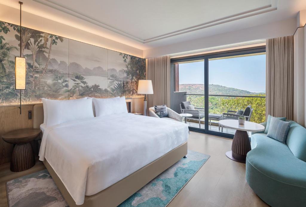Postel nebo postele na pokoji v ubytování JW Marriott Goa