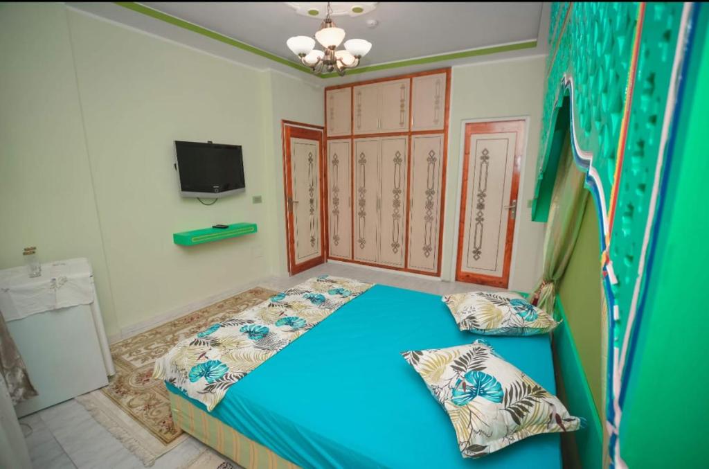 Postel nebo postele na pokoji v ubytování Maison D'hôte Dar Saida
