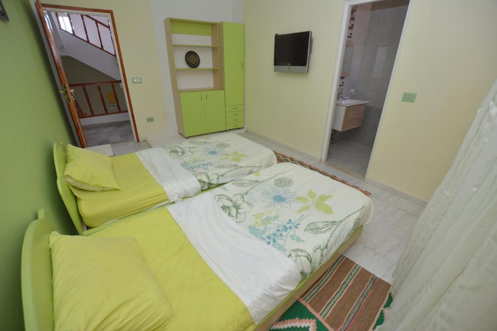 Postel nebo postele na pokoji v ubytování Maison D'hôte Dar Saida