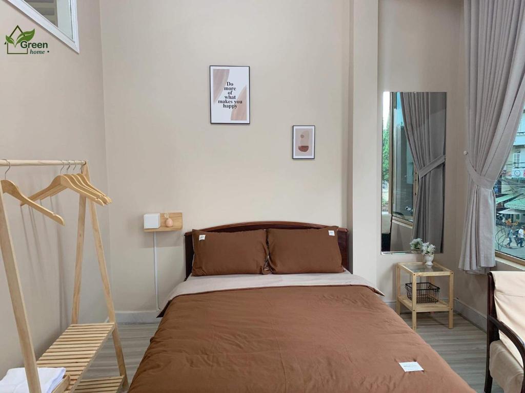 Postel nebo postele na pokoji v ubytování Vgreen Home