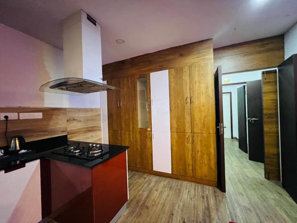 Kuchyň nebo kuchyňský kout v ubytování TCS SUITES