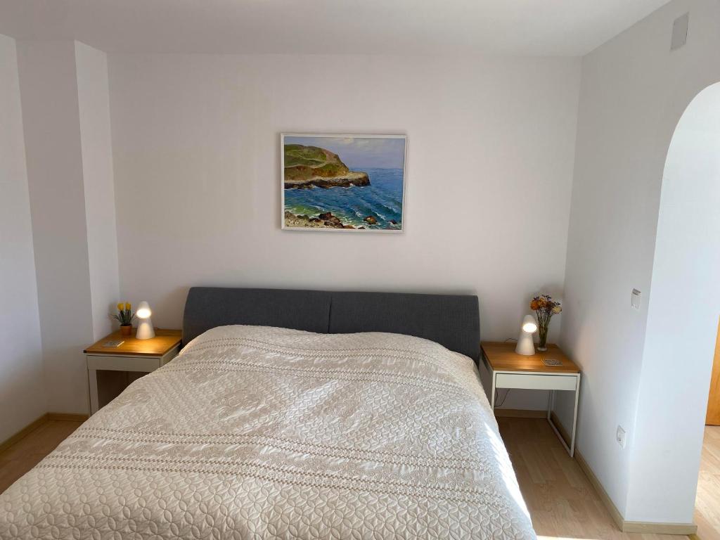 Postel nebo postele na pokoji v ubytování Haus am Hügel