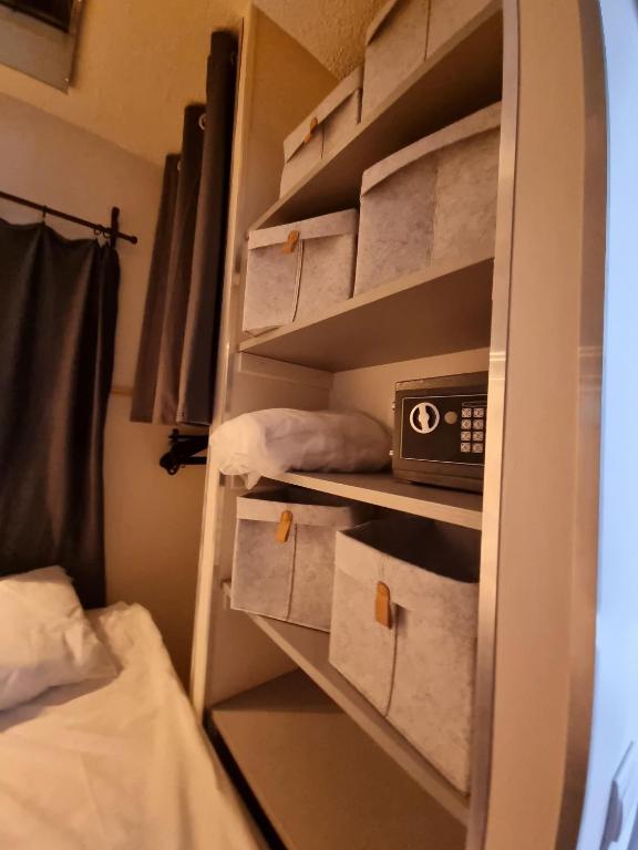 Posteľ alebo postele v izbe v ubytovaní Appartement Village Naturiste Dunes