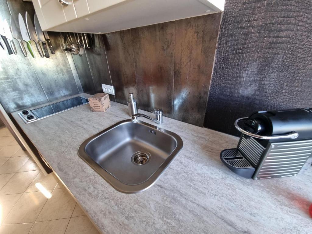 Kúpeľňa v ubytovaní Appartement Village Naturiste Dunes