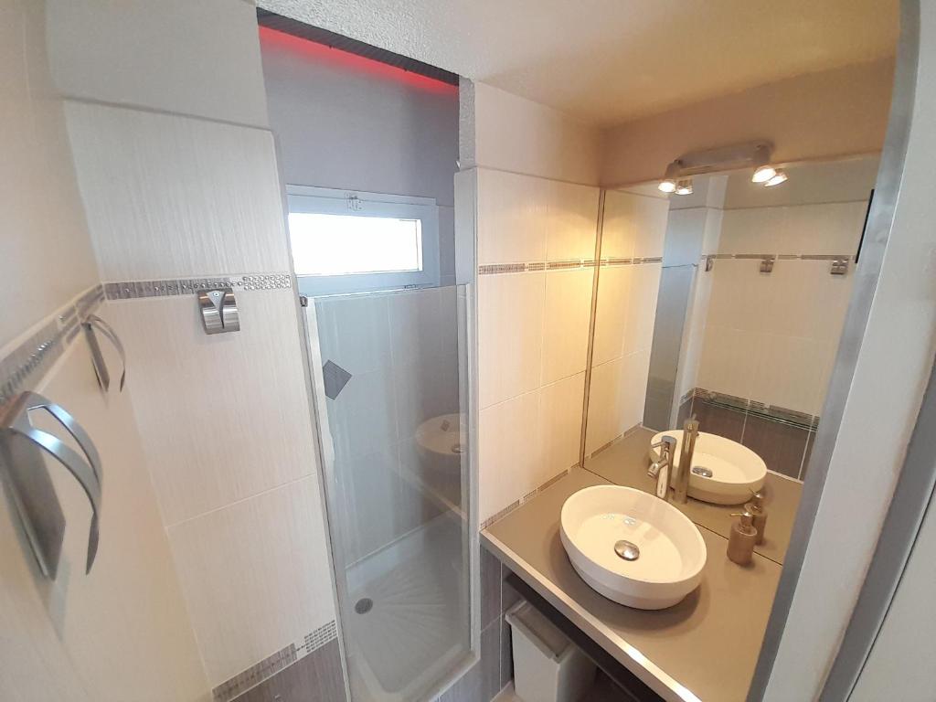 Kúpeľňa v ubytovaní Appartement Village Naturiste Dunes
