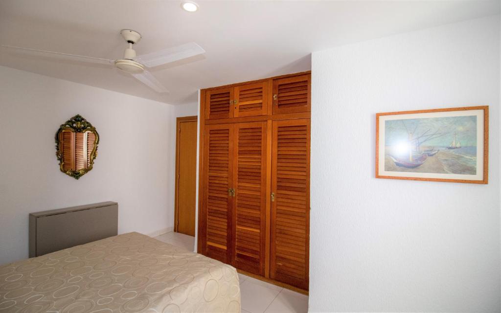 Posteľ alebo postele v izbe v ubytovaní Puerto Deportivo - Apartamento con vistas al mar - ALBERT VILLAS