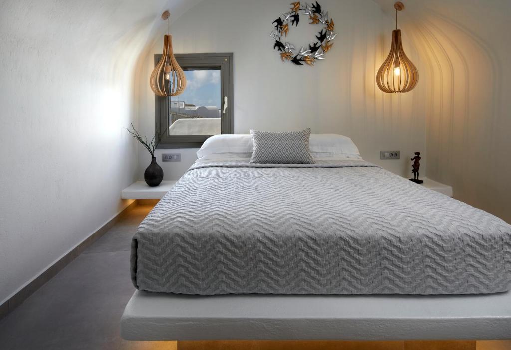 Letto o letti in una camera di Aecon Suites