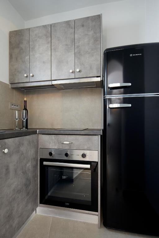 Cucina o angolo cottura di Aecon Suites