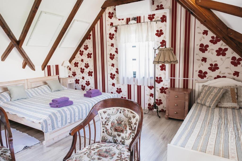 Postel nebo postele na pokoji v ubytování Cselling Udvarház