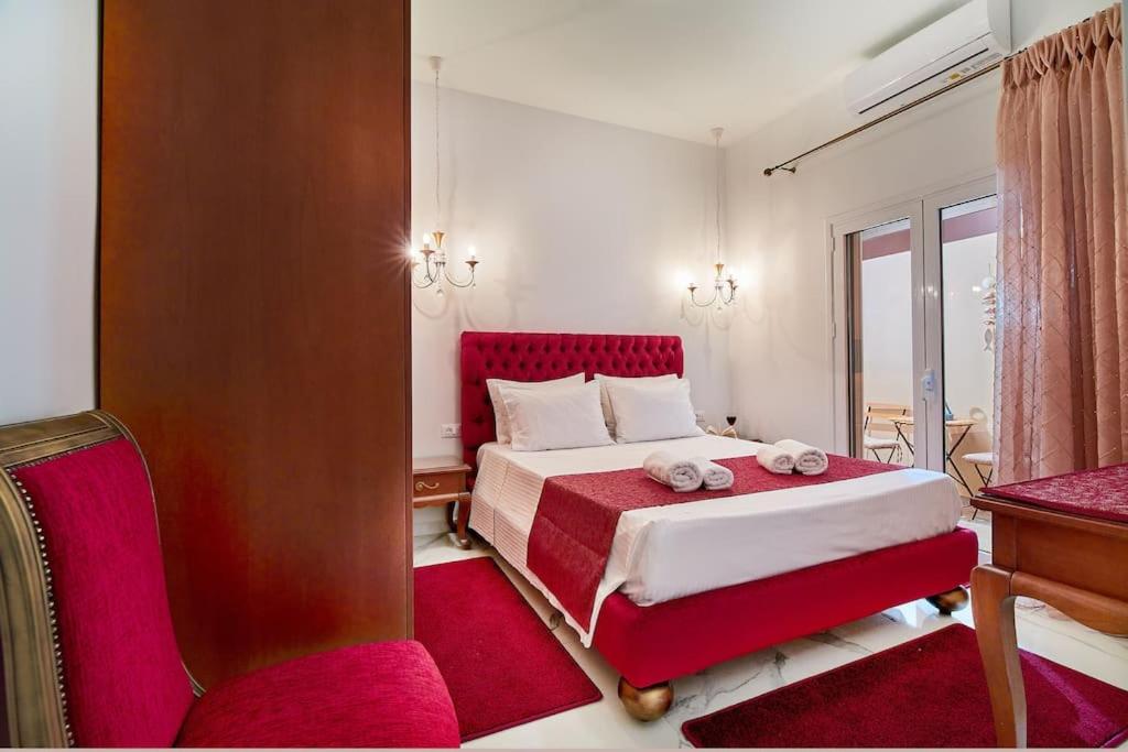 A bed or beds in a room at Dimitra Mare