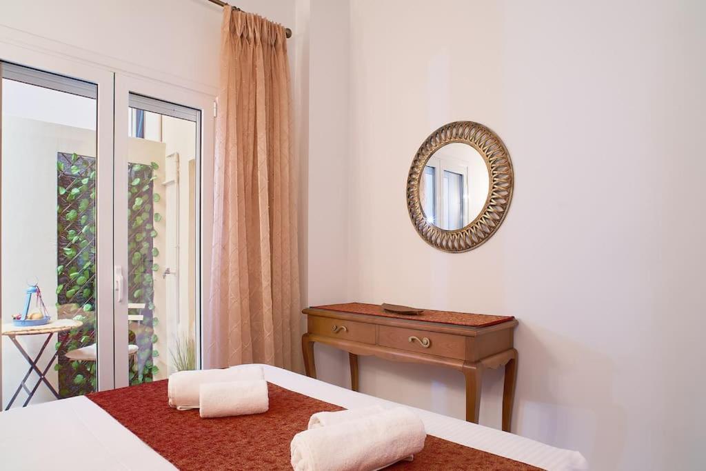 A bed or beds in a room at Dimitra Mare