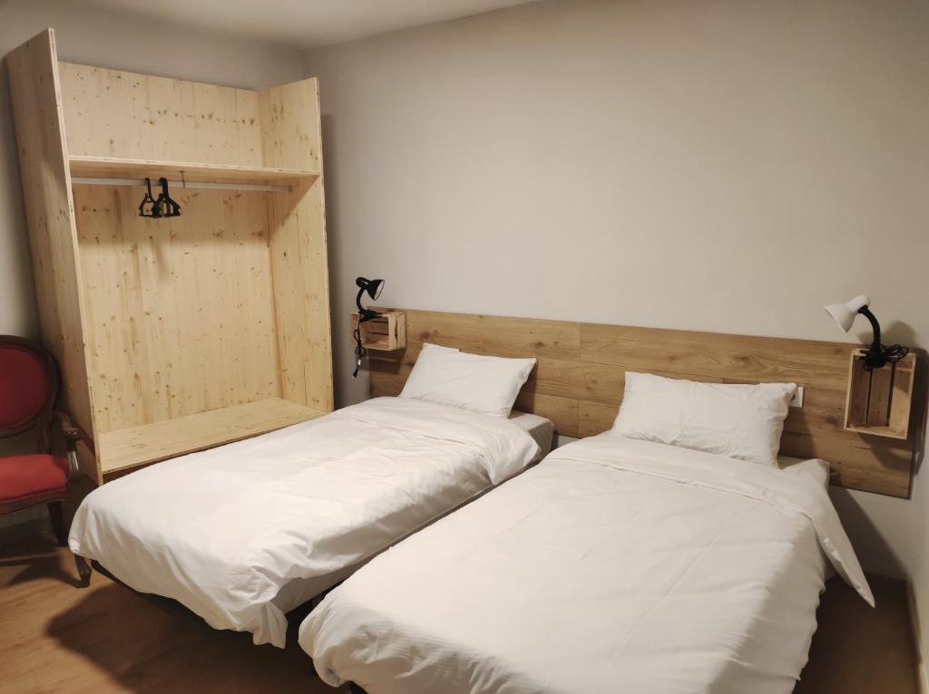 Ένα ή περισσότερα κρεβάτια σε δωμάτιο στο APT 1 Acollidor al Centre Històric de Vic APTGARBI