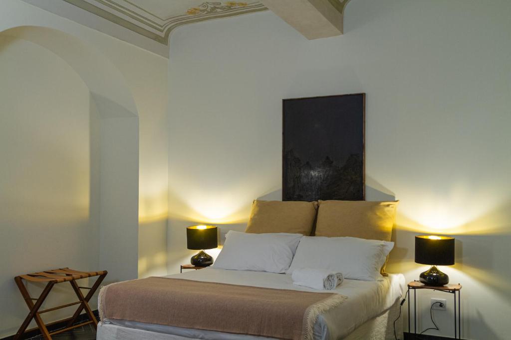 Posteľ alebo postele v izbe v ubytovaní Palazzo Glori 6