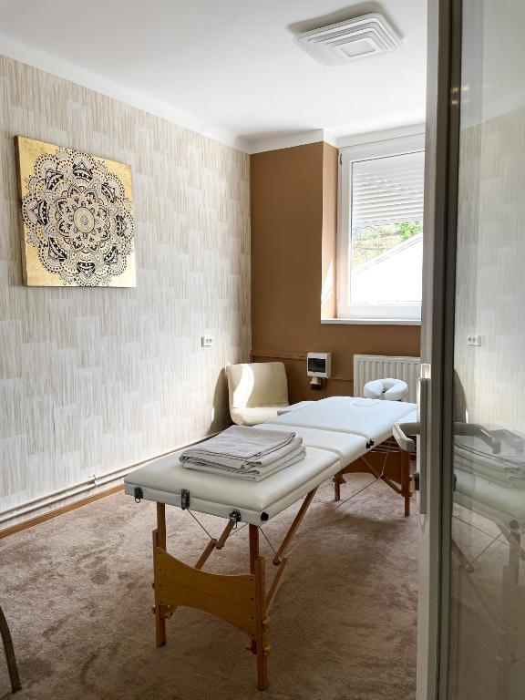 Posteľ alebo postele v izbe v ubytovaní Öreg-tó Hotel és Rendezvénytér