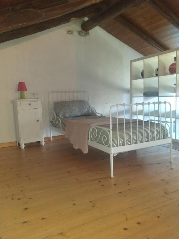 Postel nebo postele na pokoji v ubytování Casa Patrone