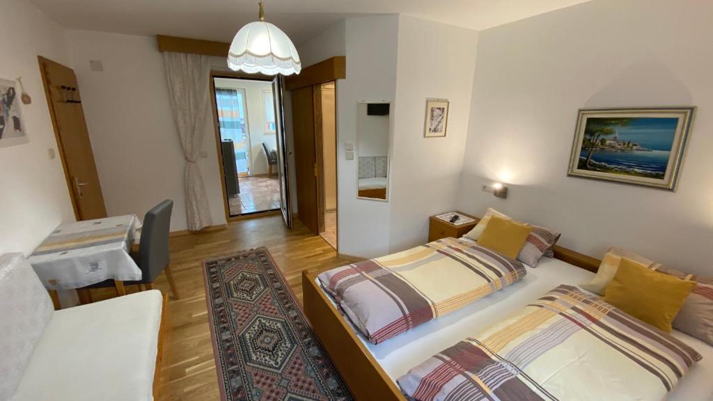 Postel nebo postele na pokoji v ubytování Haus Mairösl