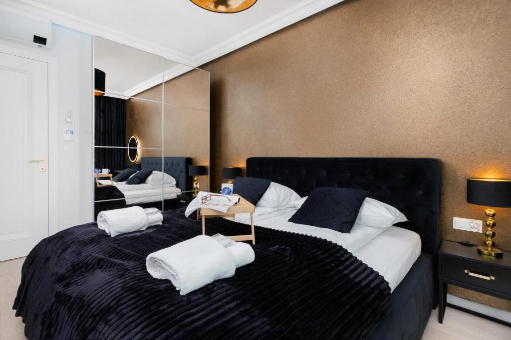 Posteľ alebo postele v izbe v ubytovaní Plac Unii Apartment Gdynia Śródmieście by Renters Prestige