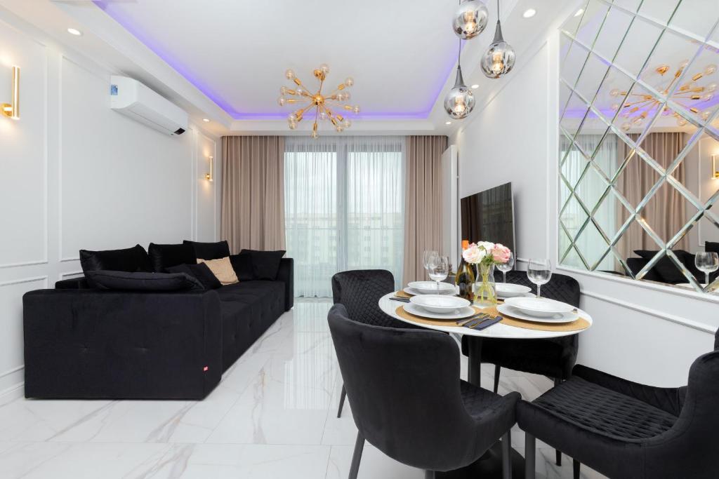 Posedenie v ubytovaní Plac Unii Apartment Gdynia Śródmieście by Renters Prestige