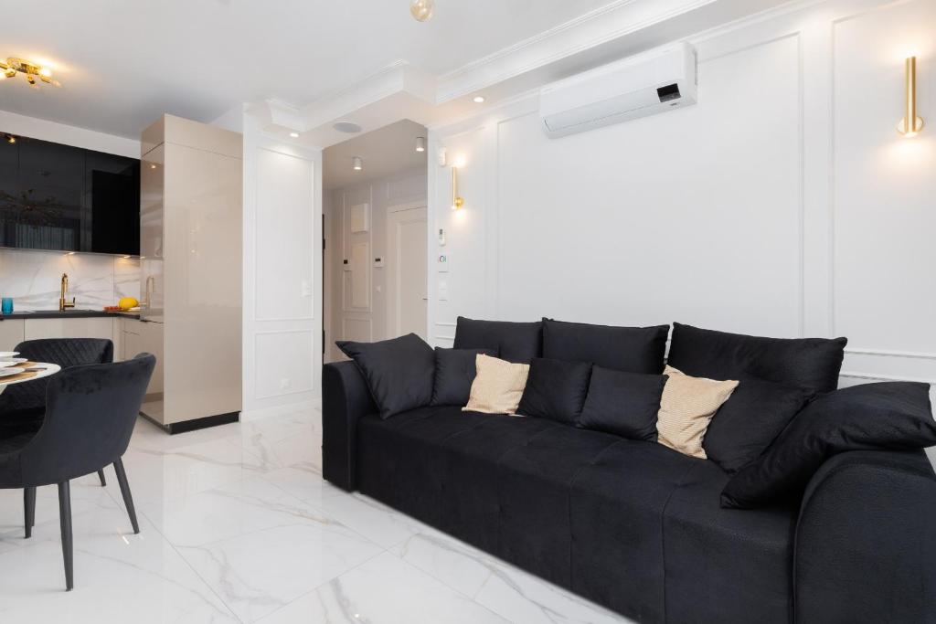 Posedenie v ubytovaní Plac Unii Apartment Gdynia Śródmieście by Renters Prestige