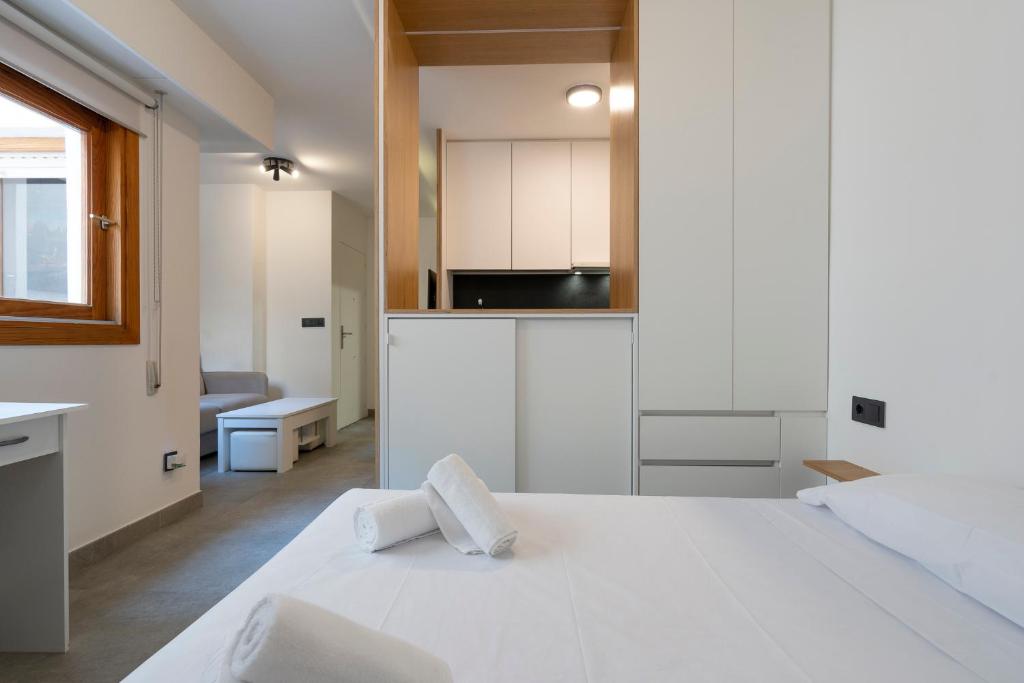 Ένα ή περισσότερα κρεβάτια σε δωμάτιο στο Estudio Plaza Correos