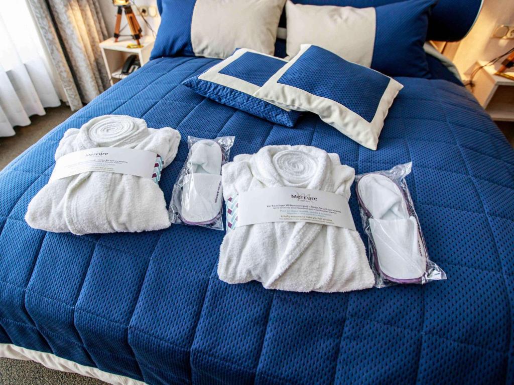 Postel nebo postele na pokoji v ubytování Mercure Hotel Riesa Dresden Elbland