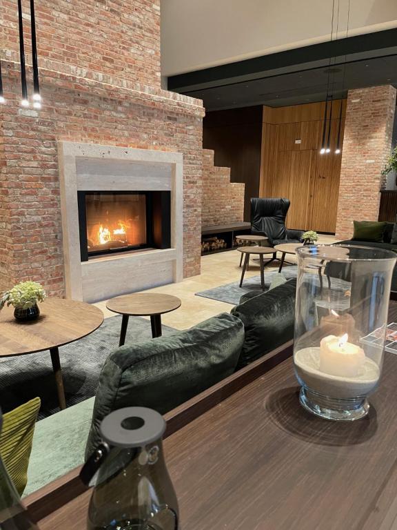 Posezení v ubytování Hotel Breitenburg
