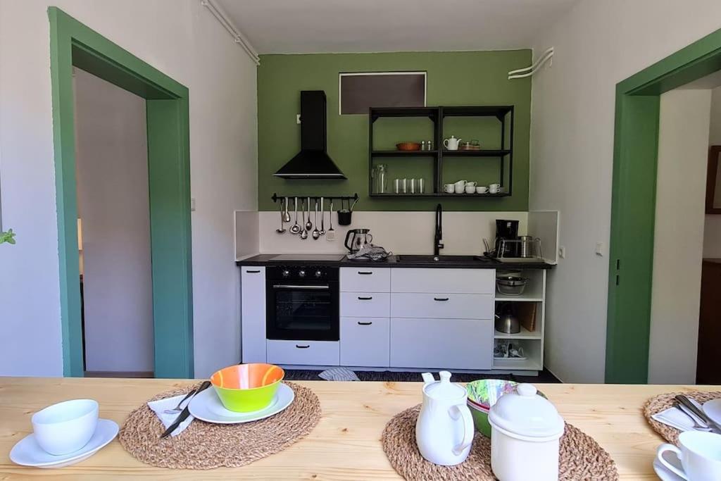A kitchen or kitchenette at Cosy Family Apartment