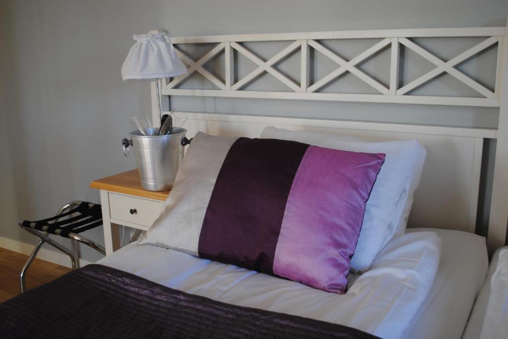 Postel nebo postele na pokoji v ubytování Hotell Nostalgi