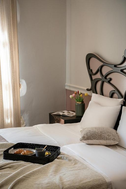Postel nebo postele na pokoji v ubytování Elia Palatino Hotel