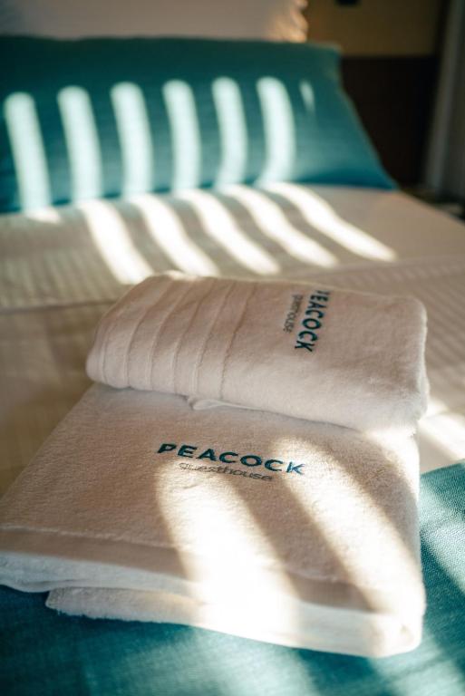 Postel nebo postele na pokoji v ubytování Peacock Villa