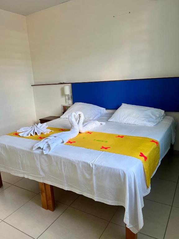 Postel nebo postele na pokoji v ubytování Hôtel DOUCE VAGUE