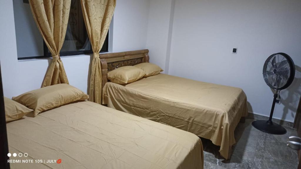 Ένα ή περισσότερα κρεβάτια σε δωμάτιο στο Casa víctoria