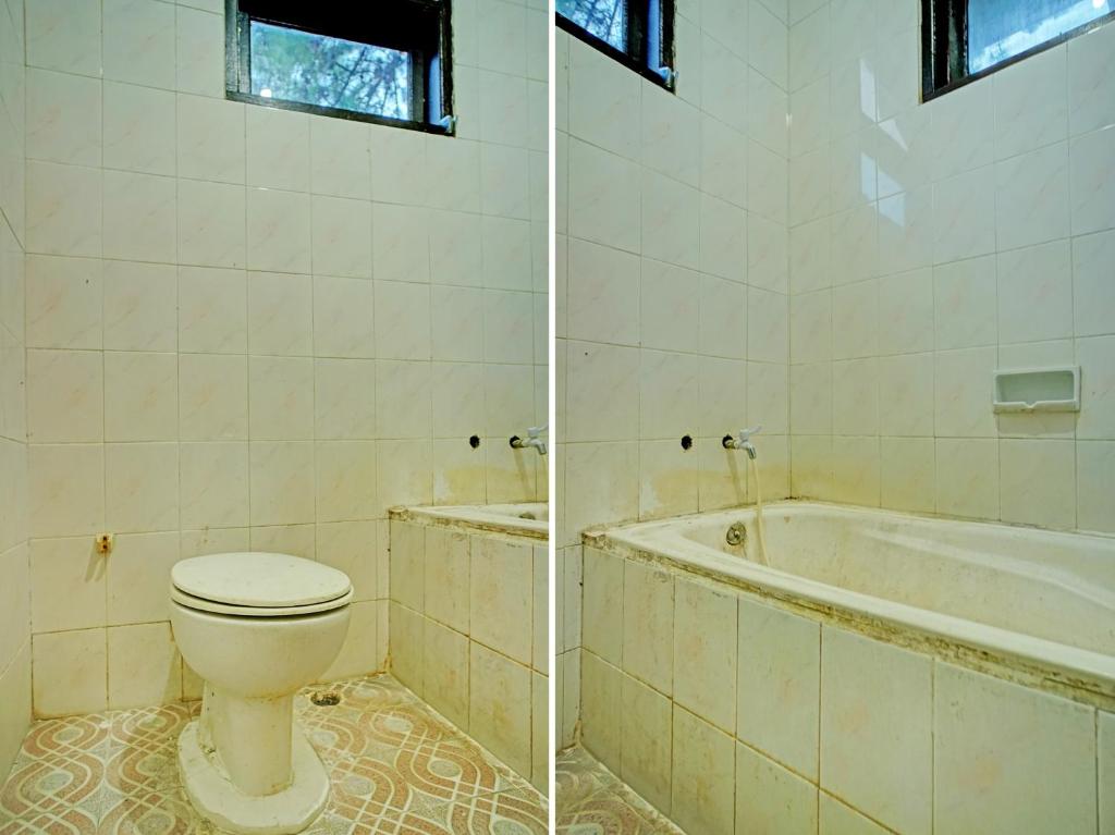Koupelna v ubytování Capital O 92214 Beristera Hotel