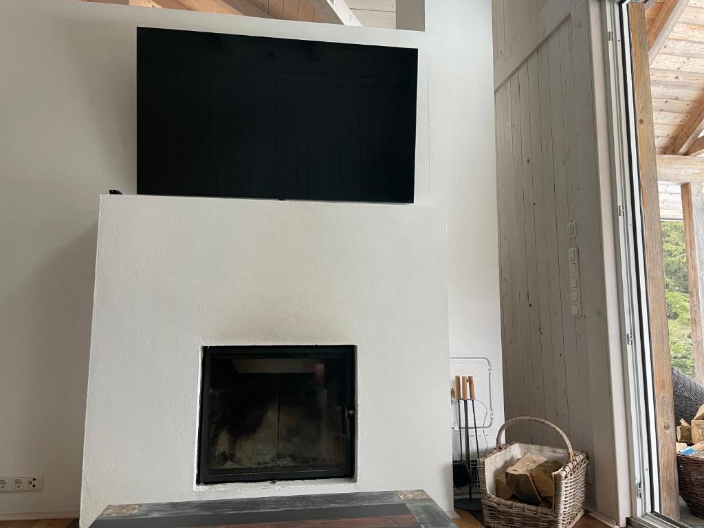 TV a/nebo společenská místnost v ubytování Teichalm Lodge Landhaus