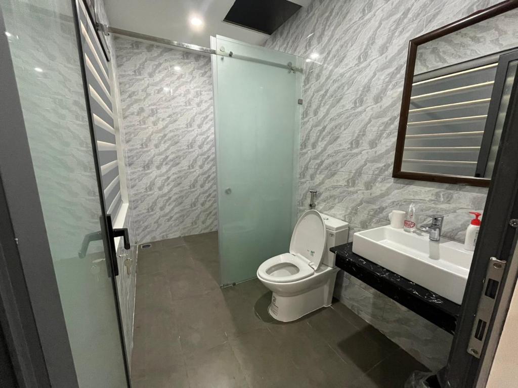 Nhà Nghỉ Ánh Dương - Habitación Doble Deluxe (2 Adultos + 1 Niño)
